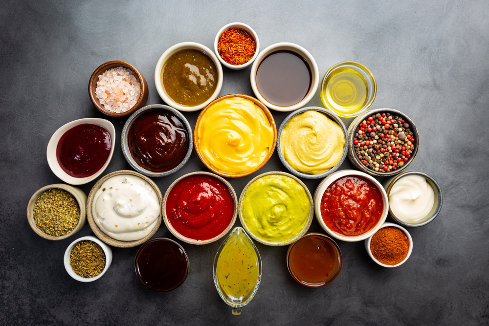 Set,Of,Different,Bowls,Of,Various,Dip,Sauces,,On,Dark