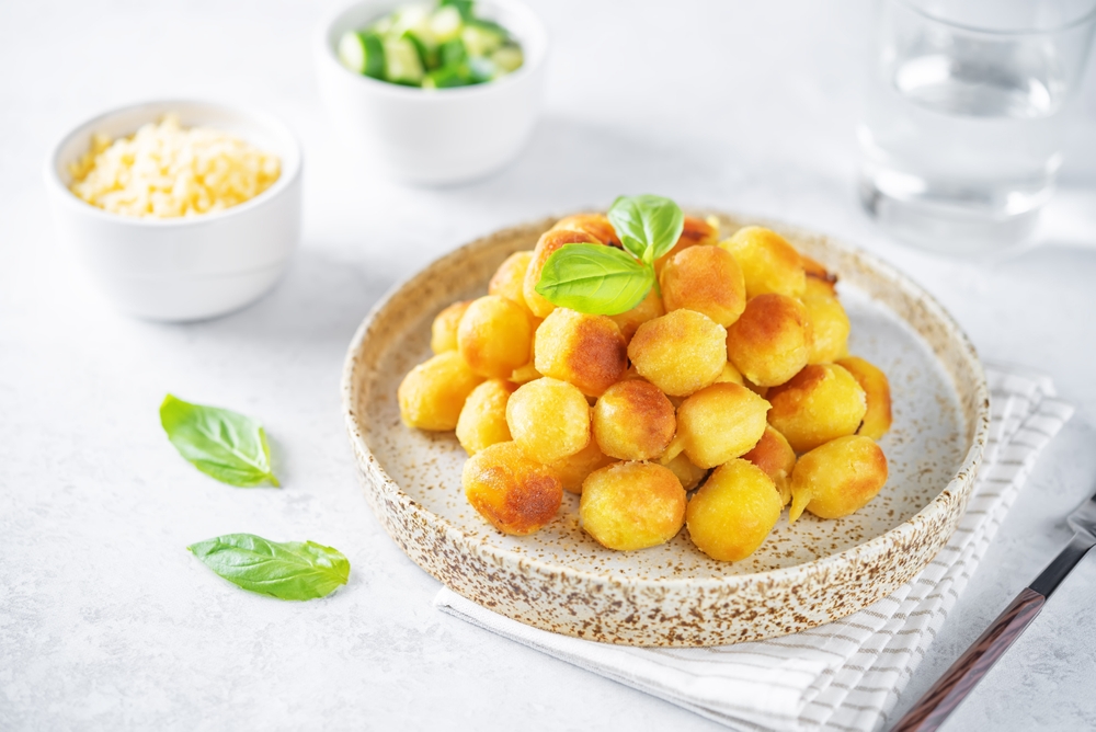 Fried,Potato,Gnocchi,With,Cheese,Filling.,Toning.,Selective,Focus