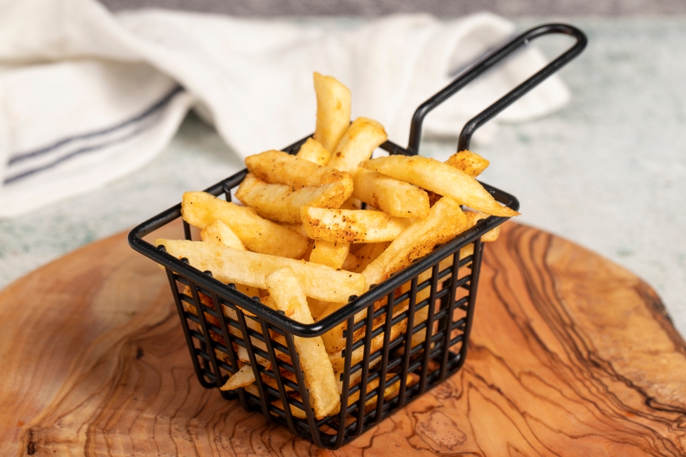 French,Fries.,Spicy,French,Fries,On,Serving,Board.,Close,Up